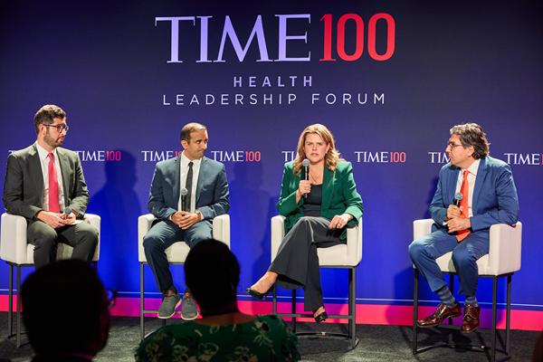 Photo of PhRMA chief operating office Lori Reilly speaking on stage on the Time100 panel of the Health Leadership Forum