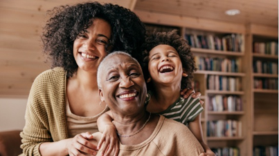 Multi-Generational family happily sitting together